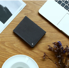 Load image into Gallery viewer, A beautiful and stylish bi-fold wallet that sorts your notes and coins like magic