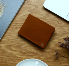 Load image into Gallery viewer, A beautiful and stylish bi-fold wallet that sorts your notes and coins like magic
